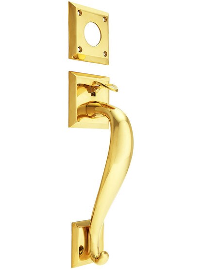 Large Door Handle with Thumb Piece in Unlacquered Brass.